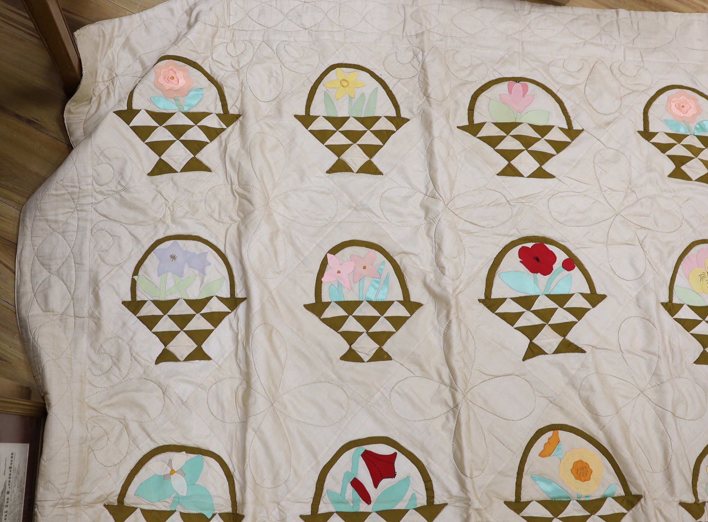 A North American embroidered silk quilt